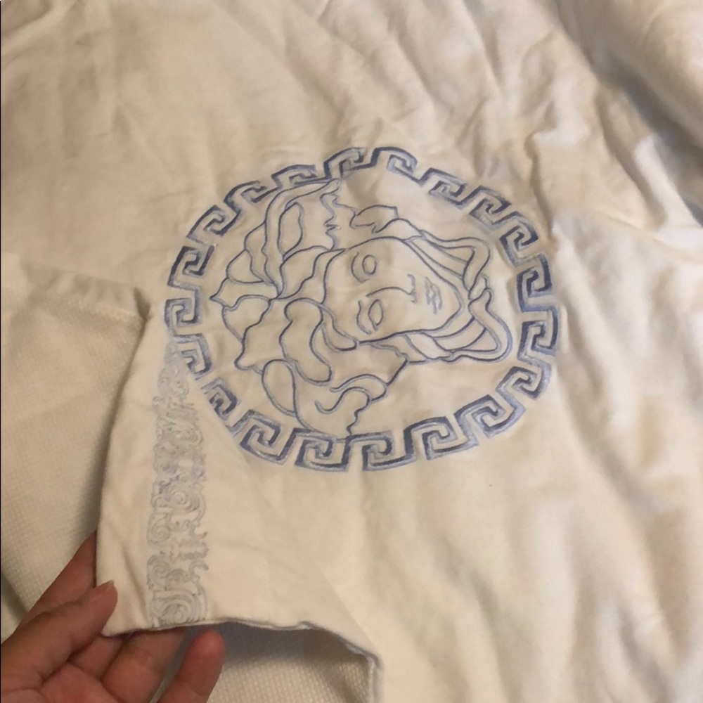 Blue Versace blanket and onesies to match